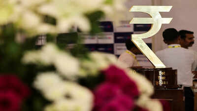 Rupee slips 35 paise vs US dollar, Sensex falls 416 points