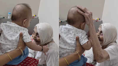 Great-Grandmother And Grandchild Interaction: Cute interaction between104-year-old great-grandmother and her 4-month-old great-grandson: What is the little baby trying to convey?