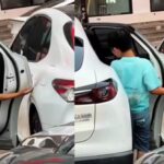 Child opens car door carefully to avoid scratches, a simple moment that reveals powerful parenting |