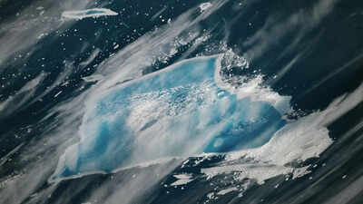 The great white giant turns blue: The final act of Iceberg A-23A