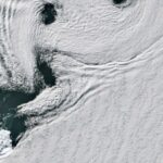 NASA captures a sea of spinning clouds over Antarctica’s remote volcanic island