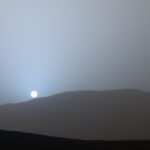 Why do sunsets on Mars glow blue despite the planet being red