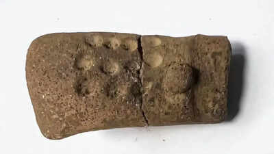 11 mysterious dots on a 2,700-year-old figurine are forcing archaeologists to rethink early writing in Guatemala