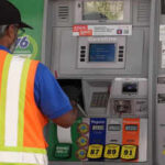 US gas dips below $4 again, yet household budgets remain under pressure
