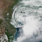 Tropical Storm Arthur hits Texas coast with flooding; weakens into low-pressure system as tornadoes threaten Midwest