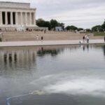 America@250 swathed in red, white, and blue — and green algae