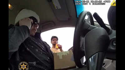 Dramatic video of Indian scammer Yug B Chauhan sipping on soda before arrest by undercover agents in Michigan