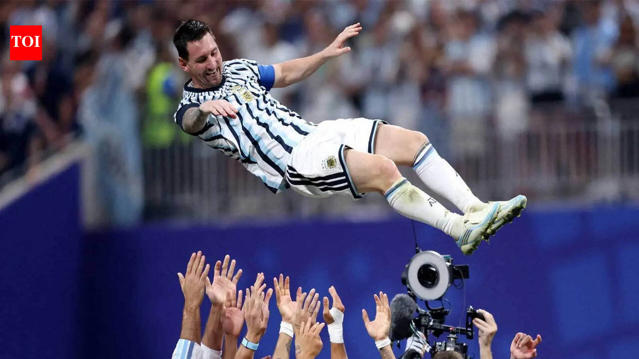 Watch: Tearful Lionel Messi lifted aloft as Argentina's locker room and Buenos Aires erupt after epic World Cup escape | Football News