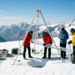 Scientists drill 33 feet into a vanishing Alpine glacier to recover a 2,000-year climate record revealing ancient silver mining, massive forest fires, and far-off volcanic eruptions