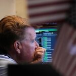 US stock market today: Wall Street sees mixed performance; Dow rises 0.3%, Nasdaq falls 0.8% as AI stocks slide