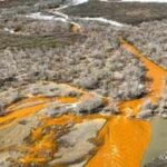 Alaska's crystal-clear rivers are turning vivid orange: Metal pollution is creating 'rusting' waterways, threatening wildlife, habitats and drinking water