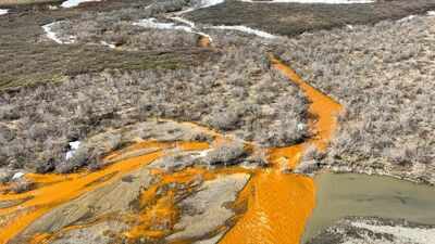 Alaska's crystal-clear rivers are turning vivid orange: Metal pollution is creating 'rusting' waterways, threatening wildlife, habitats and drinking water