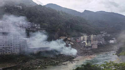 Several trapped after landslide buries homes in China's Chongqing