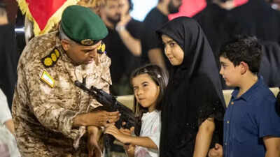 Children with guns: 12-year-olds trained, armed to man Tehran checkpoints