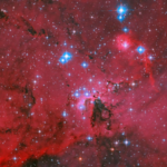 Nasa’s Hubble captures a spectacular red, white and blue stellar nursery where thousands of stars are being born