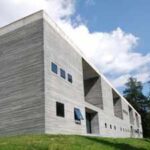 Hidden deep within the Swiss Alps, this structure was built with 60,000 stone slabs to disappear into the mountain and is now considered one of the greatest works of modern architecture