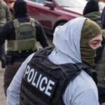 US judge blocks New York's ban on ICE officers wearing face masks