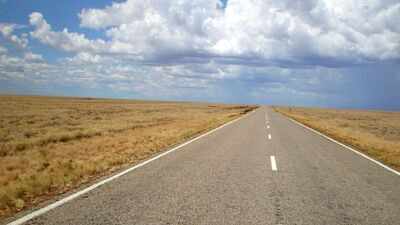 World’s longest national road in Australia is 14,500 km long and forms a giant loop around the continent, crossing deserts, rainforests and major cities