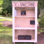 A Cumberland mother's new farm stand was stolen before she could use it; strangers John and Casey Adams rebuilt it for free, even after their tools were stolen