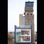 A British couple bought a derelict 85-foot, seven-storey Victorian water tower at auction; after years of painstaking work, the former asylum water supply became their family home