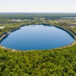 In 1993, Minnesota turned 5,000 acres of abandoned iron mines and 15 flooded pits up to 525 feet deep into Cuyuna Country; today the former mining landscape has 50+ miles of bike trails and 25 miles of shoreline