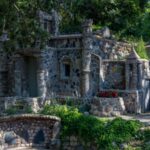 In 1932, an Ohio foundry worker lost his job and began building a rock garden; he spent 12 years creating hundreds of structures, and his wife preserved it for another 53 years