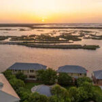 A Louisiana businessman built a house on floating barges so it could be towed into open water for duck season; the 22-person property is now asking $5.5 million