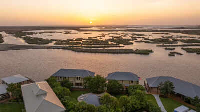 A Louisiana businessman built a house on floating barges so it could be towed into open water for duck season; the 22-person property is now asking $5.5 million