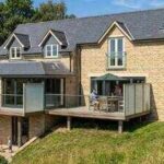 A couple built a four-bedroom home in Wiltshire for their disabled daughter in 2022, now face council demolition order after planning row over basement and Green Belt rules