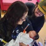 An Arizona baby stopped breathing during a post-office visit; former nurse Mary Schwarz performed CPR and helped restore her breathing on the way to hospital