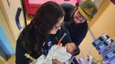 An Arizona baby stopped breathing during a post-office visit; former nurse Mary Schwarz performed CPR and helped restore her breathing on the way to hospital