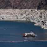 Lake Mead fell to 1,040.4 feet as the Colorado River crisis deepened; Lake Powell is also under pressure, raising questions over water and hydropower