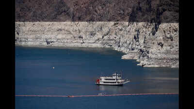 Lake Mead fell to 1,040.4 feet as the Colorado River crisis deepened; Lake Powell is also under pressure, raising questions over water and hydropower