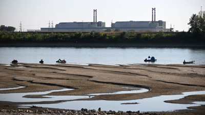 Hungary shut its only nuclear plant for the first time in 44 years after the Danube fell too low to cool its reactors; nearly half its electricity supply is now affected