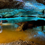 In 1905, a 13-year-old crawled through a tiny Tennessee cave passage and found a hidden underground lake