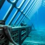 In 2019, a 165-tonne underwater art structure was submerged beneath the Great Barrier Reef; today, coral and marine creatures are slowly transforming the structure