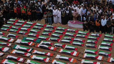 Gaza mass funeral for 112 Palestinians, including dozens of children, recovered from 2023 strike
