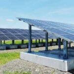New Haven turned a capped landfill into a 1,920-panel solar farm; the site now powers about 200 homes and pays the city $72,000 a year