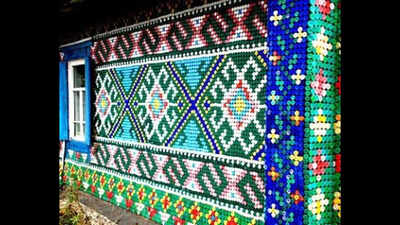 A Russian pensioner covered her Siberian home with 30,000 colourful bottle caps; the unusual recycling project turned a wooden house into a giant work of art