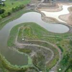 Texas turned an abandoned golf course into a 200-acre flood-control landscape; while still unfinished during Hurricane Harvey it held 100 million gallons of water