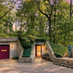 This Ohio home built entirely underground hits the market for $850,000 with a grass-covered roof that the owners literally have to mow