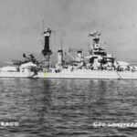 In 1944, Japanese shore guns hit USS Colorado 22 times off Tinian, killing 43 and wounding 198; the battleship stayed in action and fired back