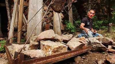 At 15, Jim Bishop bought 2.5 Colorado acres with $450 he earned mowing lawns and delivering papers; 10 years later, he began a stone castle that he spent 50 years turning into the world’s largest one-man project