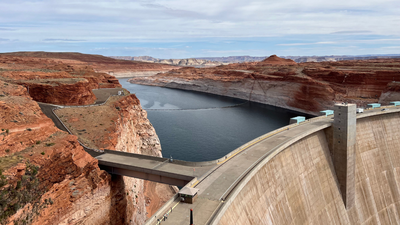 Scientists released up to 45,000 cubic feet of water per second from Glen Canyon Dam for 8 days in 1996; the artificial flood rebuilt Grand Canyon sandbars
