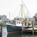 In 1929, a fisherman built a wooden boat beside the home where he was raising 13 children; nearly a century later, $1.5 million is being raised to restore it