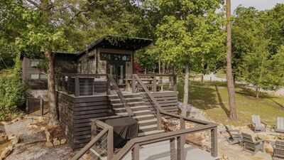 More than 40 Tennessee tiny-home owners are seeking $5 million in a 'zombie HOA' lawsuit, alleging nearly 80% of the HOA budget went to a lawn care company owned by the developer