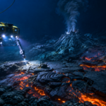 Scientists use robots more than two kilometres beneath the Pacific to discover huge lava fields around an active underwater volcano