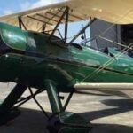 A WWII-era training plane was packed into boxes in 1953; its owner carried the pieces through 3 moves for 50 years before the forgotten aircraft was finally restored