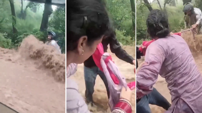 Newlywed woman takes off her dupatta to save biker trapped in Himachal flash flood; dramatic rescue by a family caught in camera; video viral