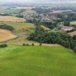 Tiny Scottish village of 200 homes in Auchtertool, Fife, fights plans for world’s second-largest data centre covering more than 100 football pitches; 1,600 objections pile up, residents fear it could dwarf their community